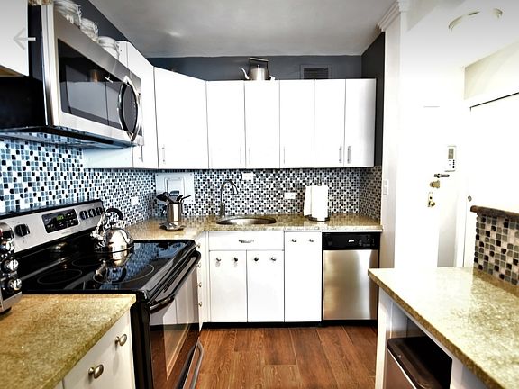 Kitchen has all stainless steel appliances and new pull down faucet just installed