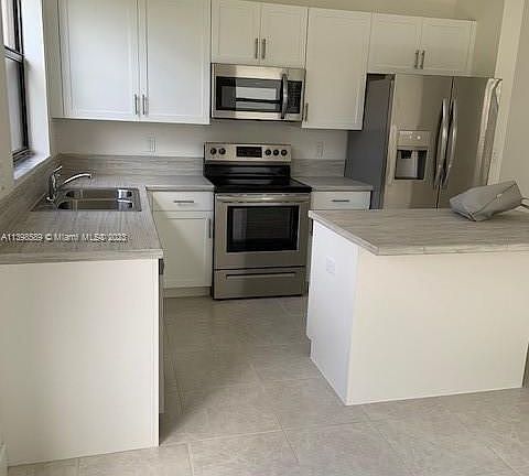 3rd image of 612 NE 207th St #3