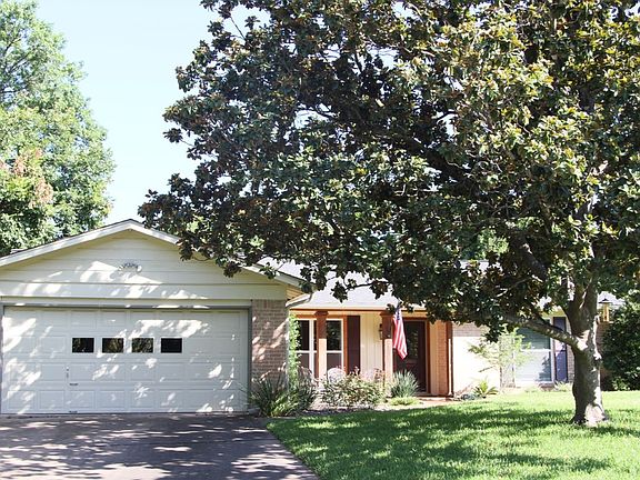 Front of house (oversized garage has plenty of storage)