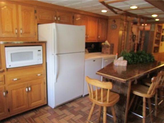 Microwave, refrigerator washer and dryer.