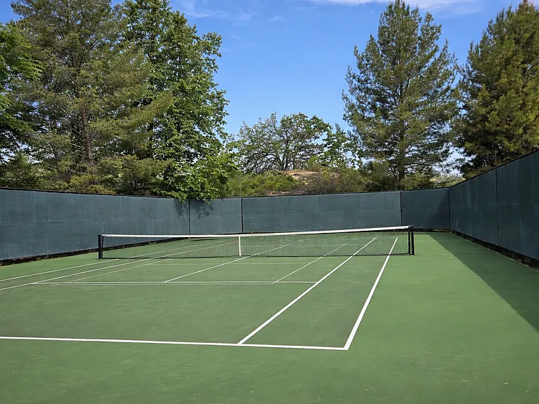 Exclusive resident tennis court with secure gated access