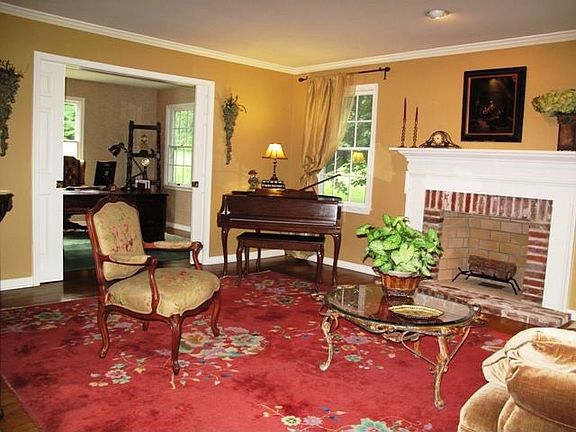 Formal Living Room w/brick Fireplace