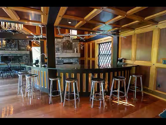 Kitchen area half circle bar going around.