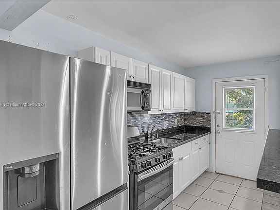 2nd image of 160 NE 203rd Ter APT 32