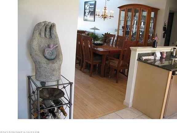 View from Front Entry through to Dining. Kitchen is on right.