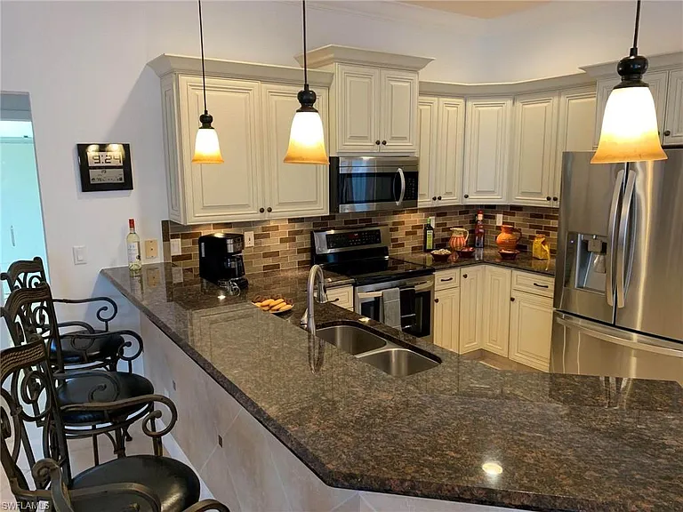 8906 Lely Island Cir — Photo 17