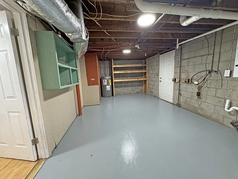 Large Storage / Utility / Laundry Room with Door to Back Yard