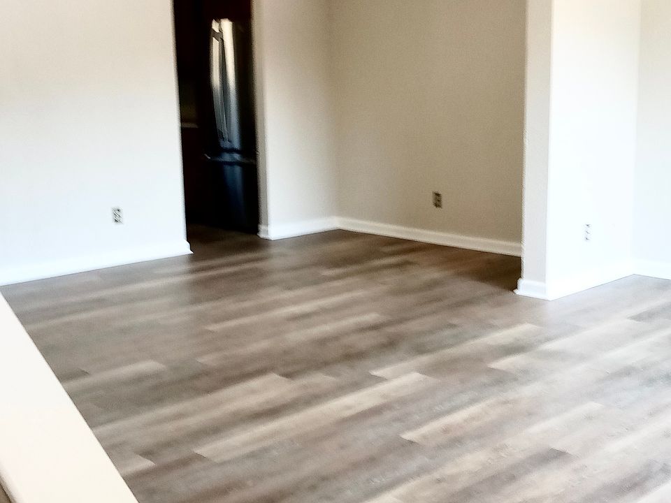 Formal dining space opens to main living room area.