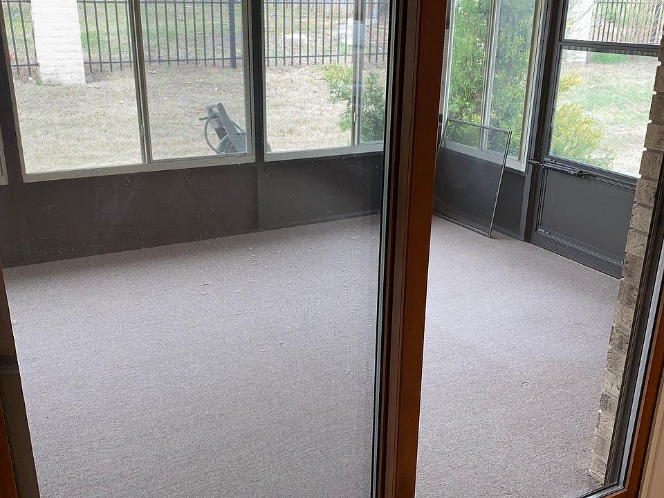 Privacy screens on back sunroom can be heated and cooled