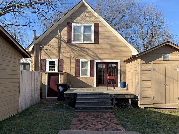 Large deck, newly sodded back yard and concrete patio for entertaining.