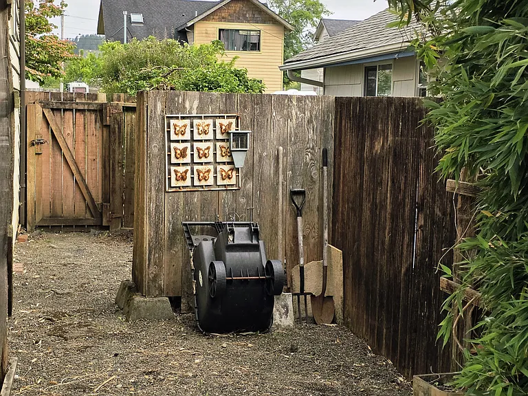 tend to your plants in this private side yard