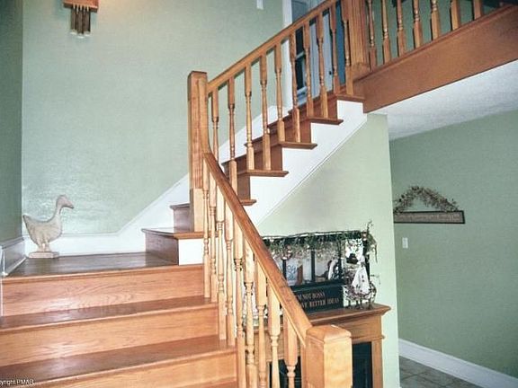 Foyer, oak stairs