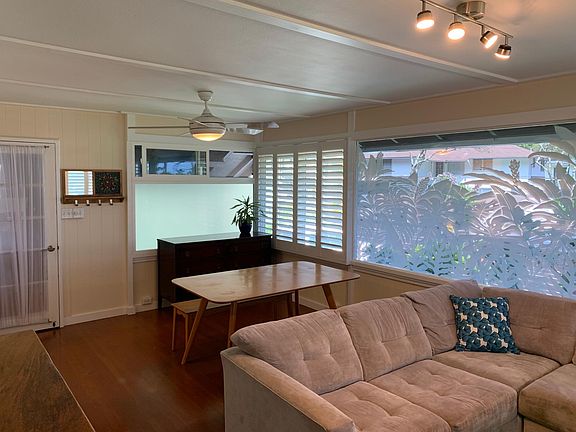 Main Living Area has Lots of incredible natural light and new plantation shutters offer ample privacy.