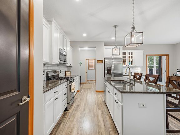 4th image of 10067 Toledo Dr N