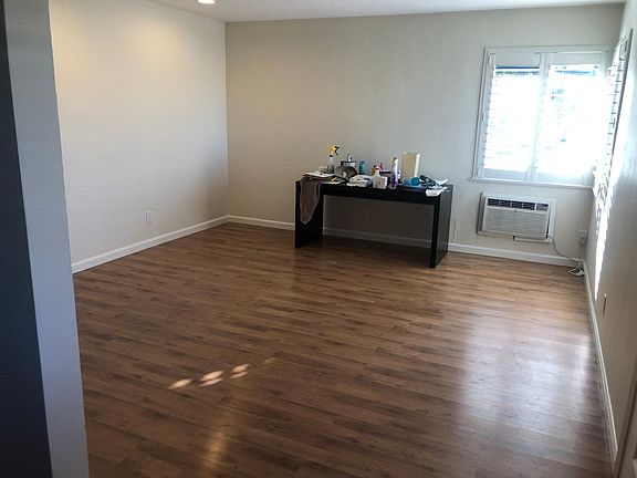 Large living room with can lights, choice of walls for your TV! Landlord will help you set up your TV mounting bracket.