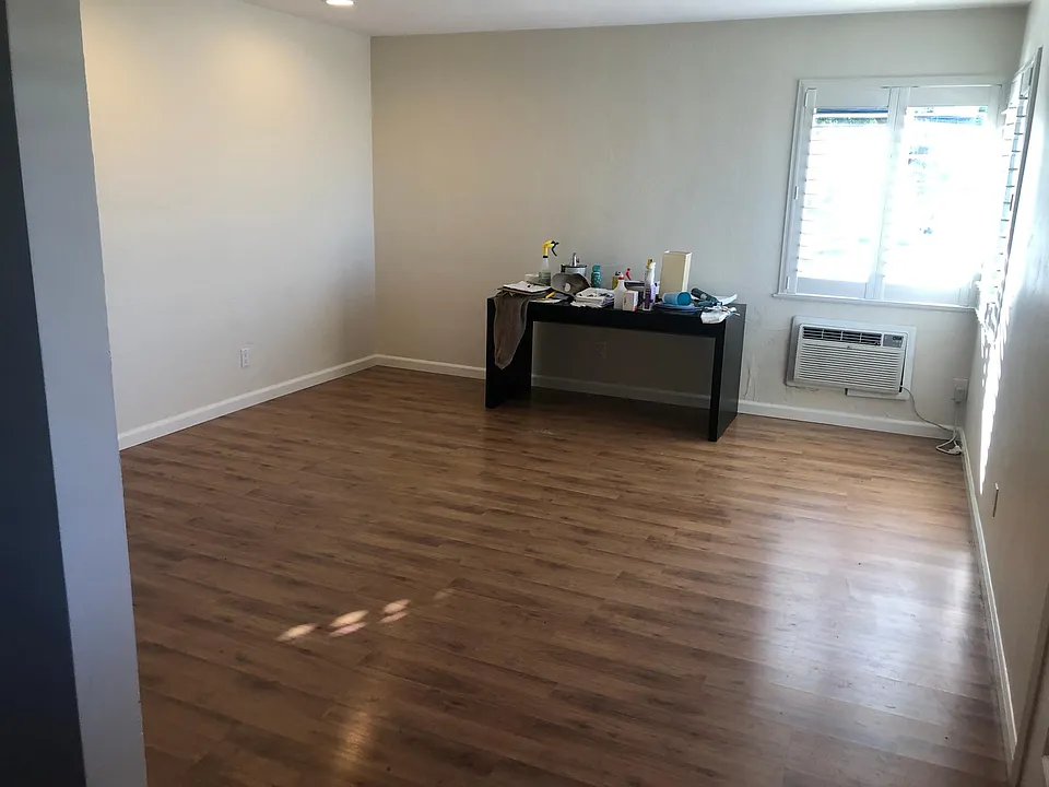 Large living room with can lights, choice of walls for your TV! Landlord will help you set up your TV mounting bracket.