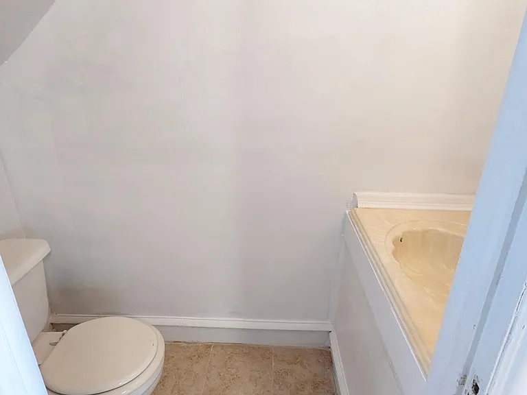 Half a bath in the basement. Newly renovated.