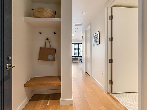 Entry way with urban mud room (bathroom on right)