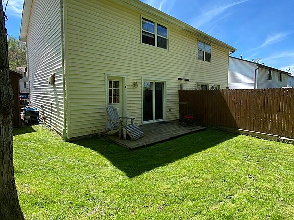 2 story end townhouse with large yard and deck.