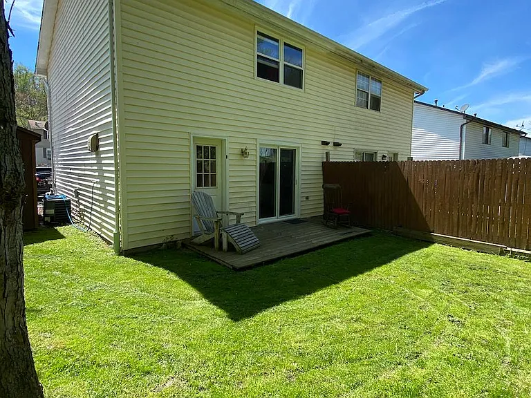 2 story end townhouse with large yard and deck.