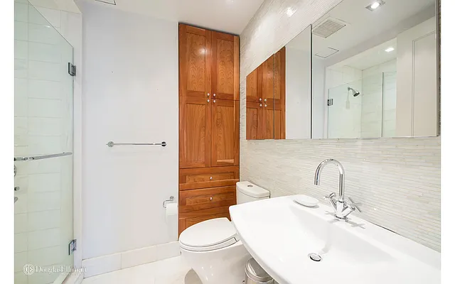 Sold by Douglas Elliman | media 18