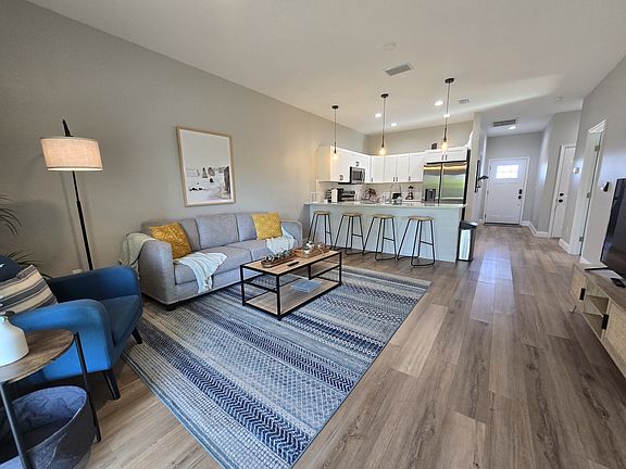 Open floor plan living room and kitchen, nicely furnished. Both are currently rented. (not furnished)
