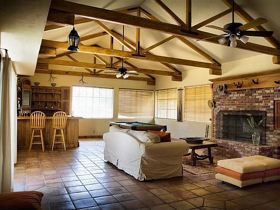 Great Room: View with Fireplace, Looking Towards Bar and Pool Table