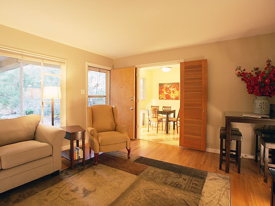 Large living room with dining table
