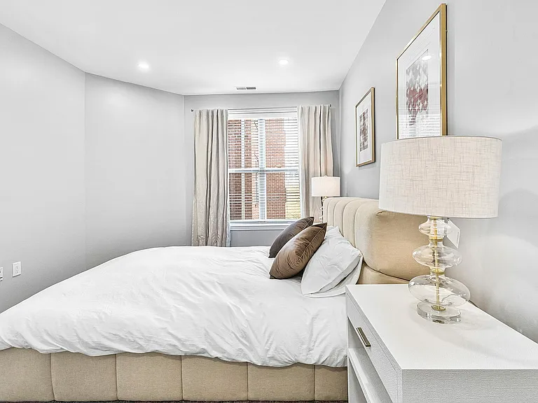 Experience comfort and elegance in this beautifully styled bedroom.