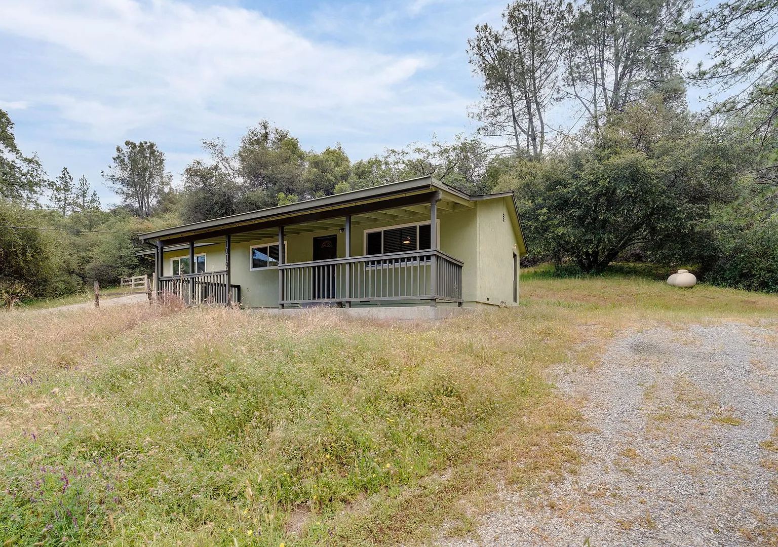 Peaceful Country Living with Updated Bathroom and Covered Porch — Photo 1