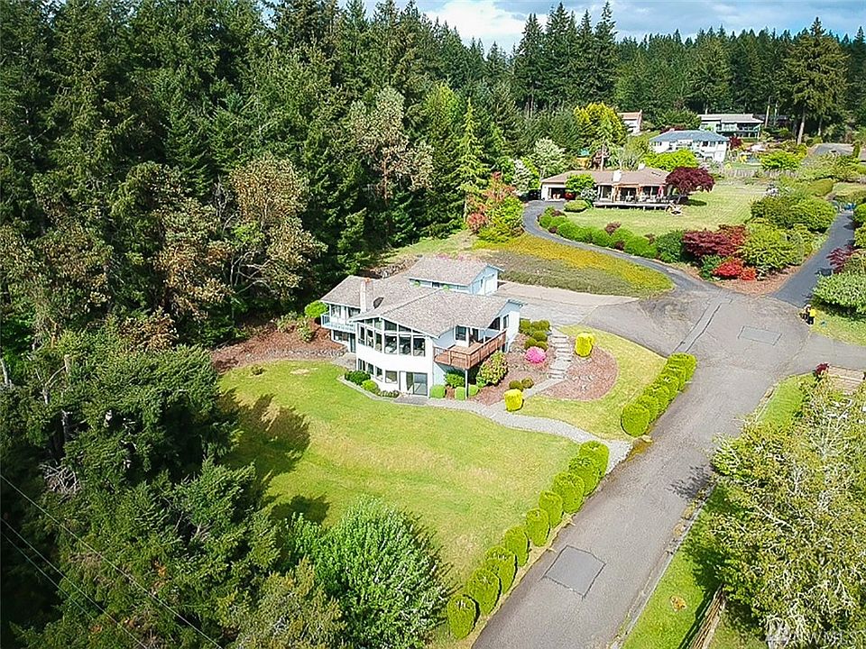 Exceptional home positioned on a beautifully manicured .80 acre lot! Notice the spacing between these homes creating a truly private oasis.