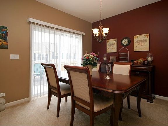 Dining Room with Open Floor Plan to Living Room