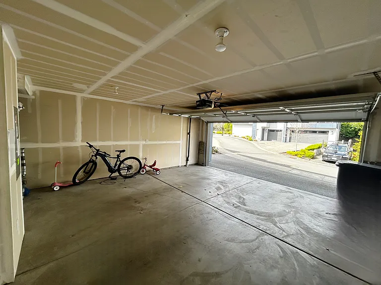 2-car garage plus driveway parking.