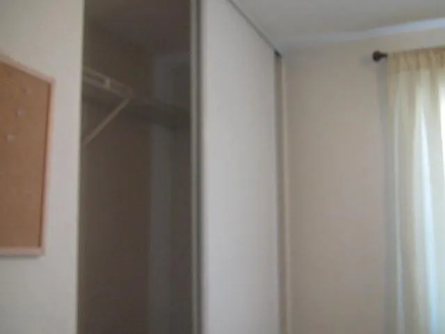 Bedroom 1: Deep closet