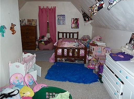 The second of three bedrooms.
