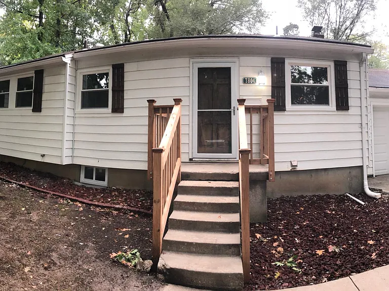 Completely Remodeled Charming Prairie Village house with Finished basement and large fenced in backyard with brand new deck!