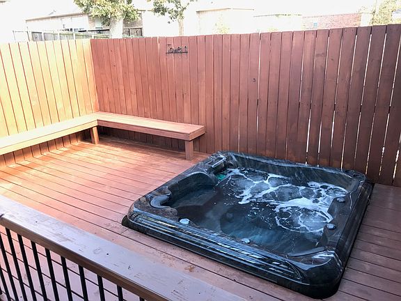 Hot tub area with bench