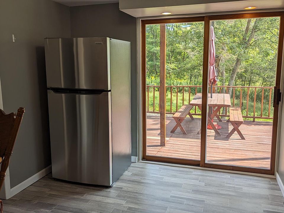 Dining/Fridge/ Sliding doors to deck