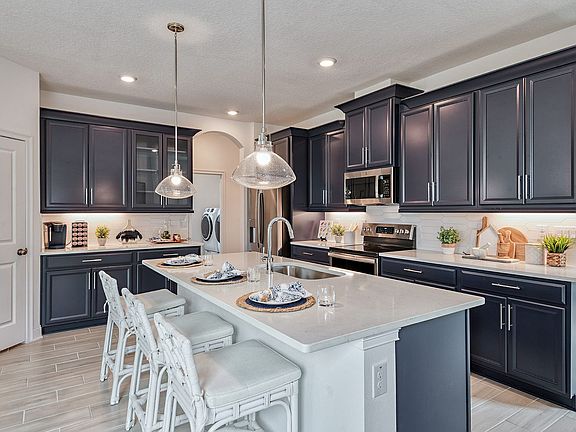 Jade model home kitchen at BridgeWater by William Ryan Homes Tampa
