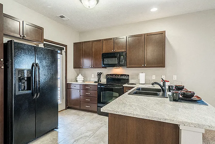 Our open kitchens offer ample counter space and modern finishes, perfect for preparing meals or hosting gatherings.