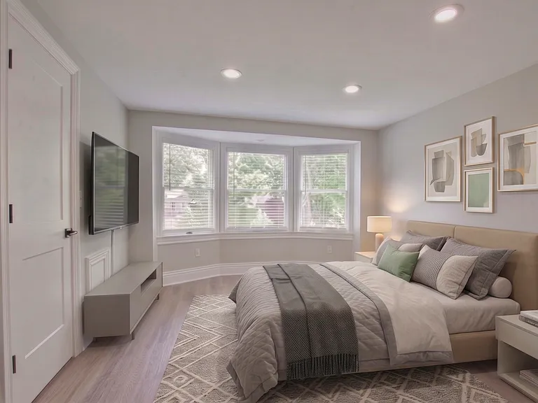 Spacious primary bedroom.

Note: Unit is unfurnished. Space is virtually furnished for staging purposes.