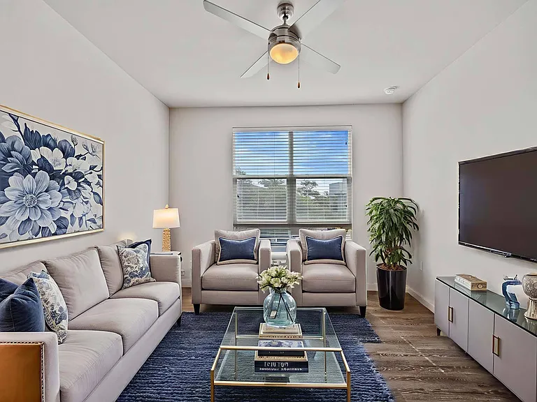 Relax and unwind in a bright, spacious living room designed for comfort and style.