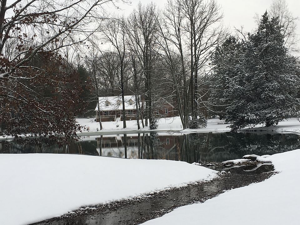 View of the house and pond.