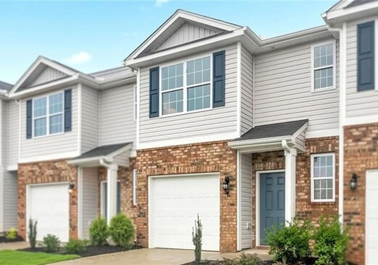 Modern 3-Bedroom Townhome with Garage in North Village Townes — Photo 1