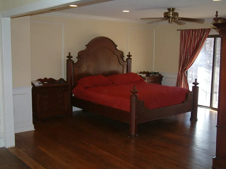 MASTER BEDROOM OVERLOOKING BACKYARD