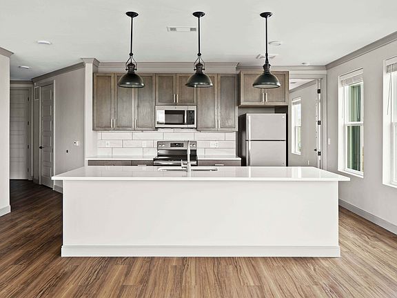 Kitchen with large island and farmhouse sink
