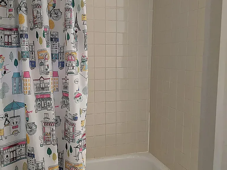 Full sized tub and shower.