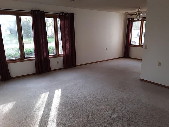 Living room and dining area from front door entry