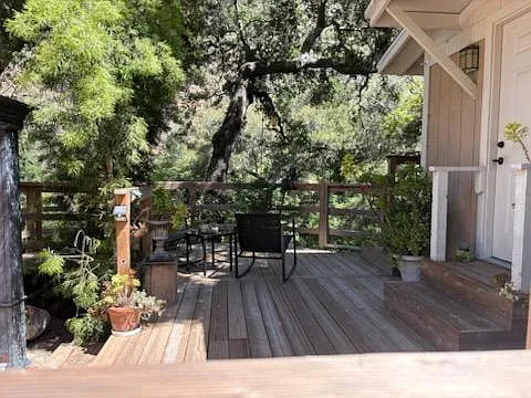 View from wrap around redwood deck in front of bungalow, view of creek below