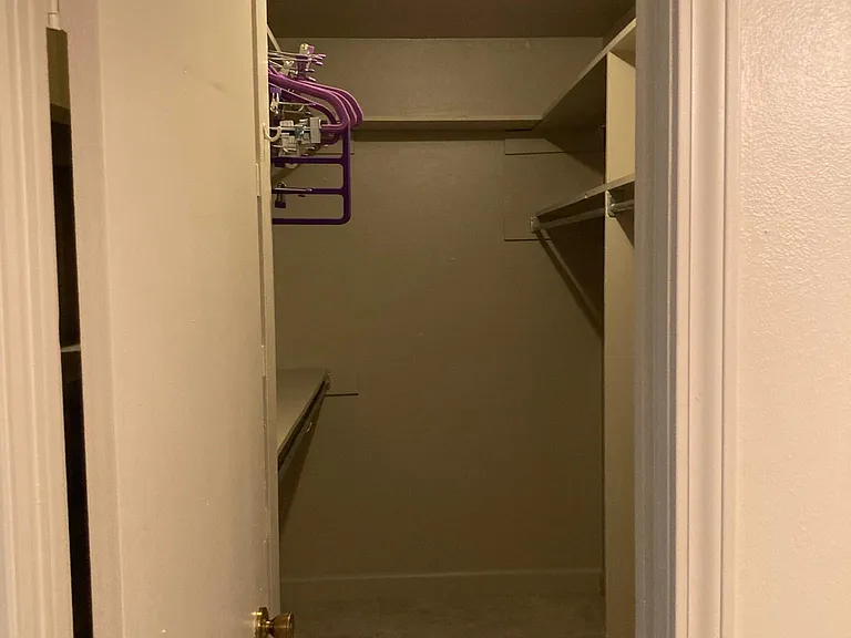 Oversized walk-in closet offers exceptional storage and organization space rarely found in comparable rentals.